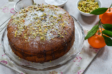 Sticker - Pistachio and orange cake sprinkled with icing sugar and crushed pistachio nuts