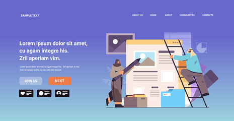 Wall Mural - arab developers couple creating website ui interface web application development program software op