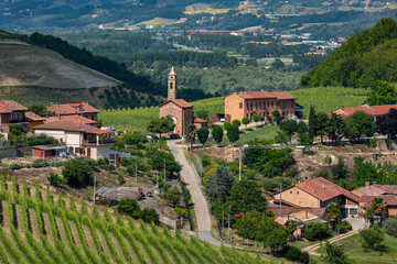 Sticker - View of village and small church in Piedmont, Italy.