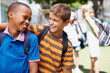© STEEX/peopleimages.com - Forming lasting friendships at school. Two boys in their school playground having a good laugh together - copyspace.