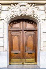 Wall Mural - Paris, an ancient wooden door, beautiful facade in the 11e arrondissement
