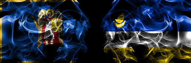 Kyiv, Kiev vs Russia, Buryatia flag. Smoke flags placed side by side isolated on black background.