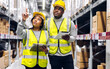 © Art_Photo - Portrait two african american engineer team shipping order detail on tablet check goods and supplies on shelves with goods inventory in factory warehouse.logistic industry and business export
