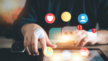Social media and digital online concept, man using smart phone at home. The concept of living on vacation and playing social media. Modern graphic interface showing online social connection network.. 