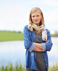 Poster - Comfy and casual. Shot of a casual, attractive blonde woman standing outdoors.