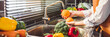 © joyfotoliakid - Hand of maid washing tomato fresh vegetables preparation healthy food in kitchen