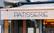 © Dragoș Asaftei - Patisserie pastry shop sign in front of the store on the streets of Paris, France.