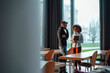 © Westend61 - Business colleagues discussing amidst desks and chairs in office