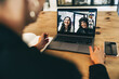 © Jacob Lund - Creative businesswoman attending a video conference in an office