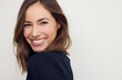 © Martin Villadsen - Beautiful portrait of young happy woman with a big smile on her face. Looking cute and sexy in camera, standing isolated on white background with copyspace.