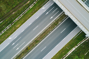 Wall Mural - Driving on open road, Aerial view of highway and bridge