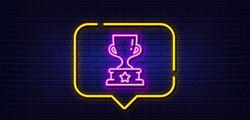 Neon light speech bubble. Winner cup line icon. Award trophy sign. Best achievement symbol. Neon light background. Winner cup glow line. Brick wall banner. Vector