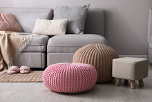 Stylish Poufs And Ottoman Near Sofa In Living Room. Interior Element