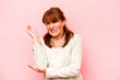 © Asier - Middle age caucasian woman isolated on pink background massaging elbow, suffering after a bad movement.