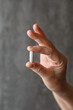 © Yura - close-up female adult hand holding a pill