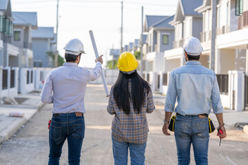 Fototapete - Architect and engineer meeting planning for a new project about detail of building at construction site.