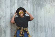 Close-up Portrait Stylish Young African American Girl With Curly Hair In Fashionable Sunglasses In Urban With Copy Space And Place For Advertising - Summer Hipster Photos With Instagram Style