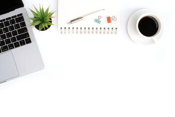 Wall Mural - Top view business finance office and marketing concept on white table desk with keyboard computer and graph document, coffee cup and stationery, flat lay with copy space