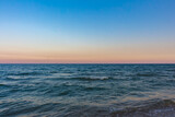 Fototapeta Morze - horizon over the sea at dawn..