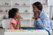 © Prostock-studio - Speech-language pathologist having lesson with little girl