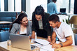 © Nicholas F/peopleimages.com - Theyre always thorough about their plans. Shot of a group of businesspeople going through paperwork together in an office.