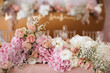 © Yevhenii Kukulka - Decoration for a holiday party. Bouquet of fresh flowers on the wedding table