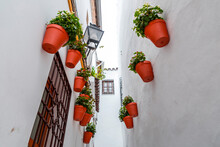 Street Scene With Traditional Andalucian Architecture In The Historical City Of Cordoba, Spain