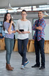 © Yuri A/peopleimages.com - Were ready to take it on. Full length portrait of three creative coworkers smiling confidently at the camera.