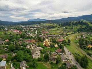  Settlement in the mountains of the Ukrainian Carpathians. Aerial drone view.