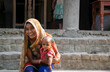 © IndiaPix - happy mother and her child in rural village, India