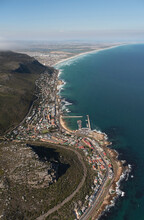 Kalk Bay, Cape Town, South Africa. 2022. Aerial View Of The Fishing Harbour And Town At Kalk Bay Waterfront. Looking Along Coast Towards Muizenberg