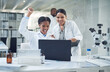 © Nicholas Felix/peopleimages.com - Well make history with this. Shot of a group of scientists cheering while working in a lab.