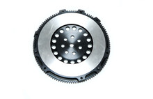 The Shiny New Lightweight Engine Flywheel Isolated In A White Background. 
