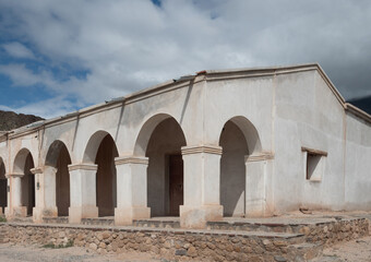 Wall Mural - Imposing ruins of abandoned houses on the road between Cachi and Cafayate, Salta Province, Northern Argentina