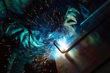 Wall Mural - Arc welding of iron parts, close up view