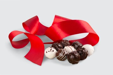 Poster - A box with tasty sweet chocolates candies on the desk