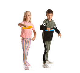 Wall Mural - Funny children playing frisbee on white background