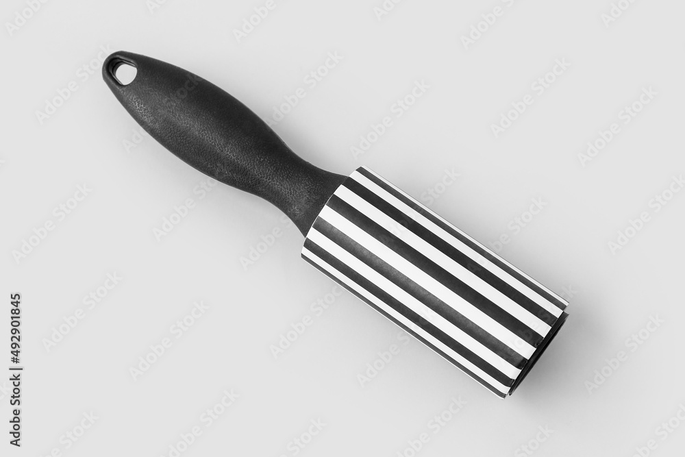 New lint roller on light background