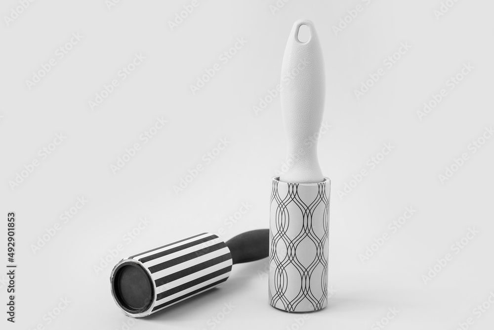 New lint rollers on light background