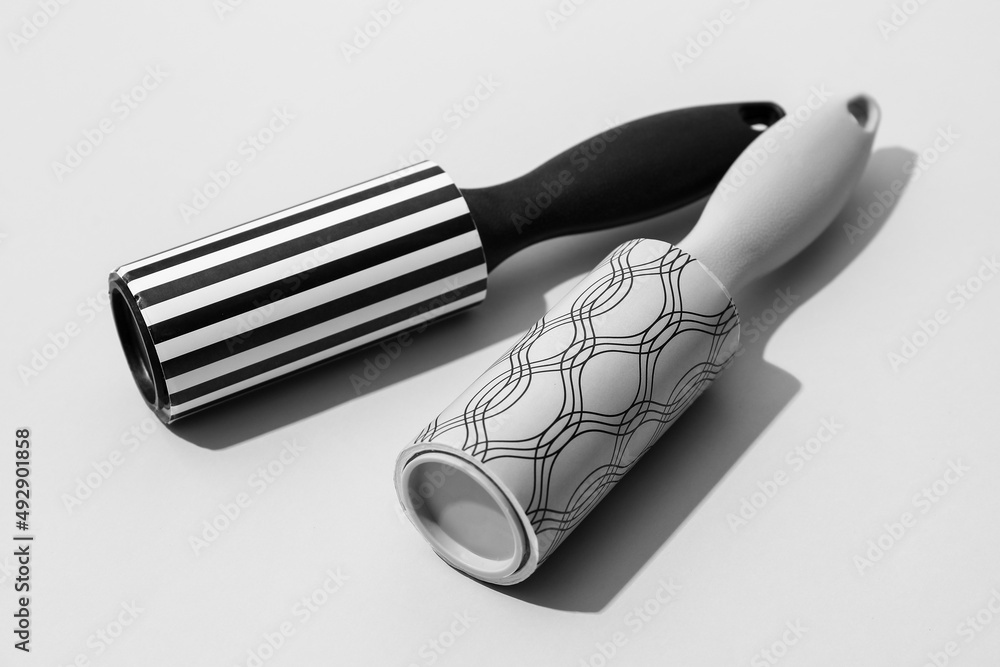 New lint rollers on light background