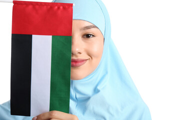 Wall Mural - Beautiful Muslim woman with UAE flag on white background