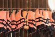 life jackets hanging on clothes rack