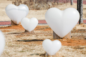 two hearts on wooden background