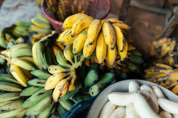 Canvas Print - cultivated banana for processing ,Banana in the hand of the seller