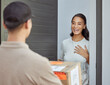 © Siphosethu Fanti/peopleimages.com - Hi I believe I have a delivery for you. Shot of a young woman receiving an order.