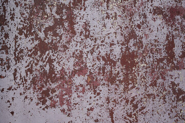 Wall Mural - Pattern and texture of old dried paint on a rough metal surface