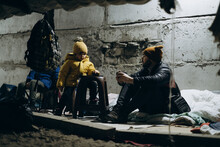 War In Ukraine. The Family Is In A Bomb Shelter.