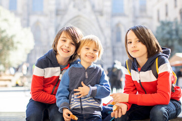 Sticker - Cute little children tourists admiring Barcelona city, family travel with kids