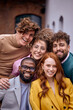 © Roman - Close-up Portrait of Cheerful Multi-ethnic Business People Posing At Camera Outdoors, Cheerfully Smiling, Dressed In Fashionable Elegant Clothes. Friendly Caucasian And Afro American Colleagues