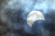 solar eclipse, sun moon and clouds, partial eclipse